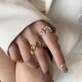Lava-style liquid metal open rings set in polished gold and silver finishes - Liquid Metal Lava Style (TJZ285)