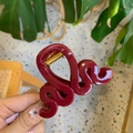 Macro detail of the deep red wave hair claw clip featuring a metallic gold spring - Wine Red - Double Wave Claw