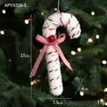 Red and white glitter candy cane Christmas tree ornament with ribbon bow and small bell - Candy Cane Style C