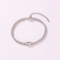 Elegant silver tennis bracelet with emerald-cut cubic zirconia centerpiece - Rectangular Style (Clear Rhinestone) / White Gold