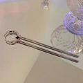 Silver crescent moon hair pin with black stone inlay on reflective mirror background - Double Crescent Black Stone Style (HH2120)