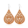 Macro view of teardrop wood earrings featuring intricate filigree hollow patterns - Style 26/Teardrop Hollow Swirl Polka Dot