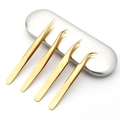 Golden stainless steel lash tweezer set of 4 pieces with silver storage case - Titanium Gold 4-Piece Tweezer Set with Silver Aluminum Box