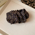 Leopard print fabric scrunchie with textured pleats on a minimalist beige tray - Brown Yellow Retro Leopard Twisted Clip