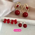 3-pair set of red heart pearl earrings with gold accents and elegant ribbon designs - Satin Bowknot Round Bead Style (1#HE29498)