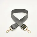 Adjustable grey nylon replacement shoulder strap with polished gold-tone metal lobster clasps - Gray