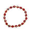 Detail view of Evil Eye beaded bracelet with red evil eye charms and golden metal spacer beads - Red