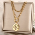Close-up of golden Tree of Life pendant on a layered Cuban link chain jewelry box - Gold (KN236395-Z)
