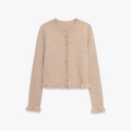 Dettaglio dei bordi con volant e della maglia di questo cardigan color avena - S / Bianco Sporco