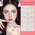 Silver hollow heart-shaped rhinestone face stickers with 15 self-adhesive gems - Hollow Heart