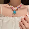 Colorful beaded necklace featuring a blue star pendant and silver butterfly charms - Colorful Flower Bow Star Style