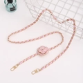 Detailed view of pink leather woven chain with camellia flower and pearl accents - Crossbody Chain / Pink