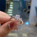 Close-up of a silver ring with a large round cubic zirconia and bow details - TJZ398-Bowknot Decoration