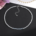 Detail of beaded necklace with white pearls, blue frosted stones and silver lobster clasp - Style 9