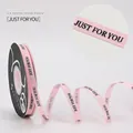 1cm pink grosgrain ribbon with black JUST FOR YOU print on a black spool for DIY - 1CM Grosgrain Ribbon [Pink just] 40 Yards