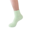 Women's fuzzy slipper sock in light green coral fleece with soft plush texture - Fruit Green