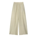 Détail d'un pantalon large taille haute en satin beige brillant avec taille élastique - Pantalon Blanc Crème