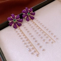 Detail of vintage purple flower earrings with gold fringe tassels and white pearls - Vintage Tassel Flower Pendant Style