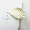 Elegant beige fan-shaped marble texture hair claw clip shown holding white paper - Matte Rubber Cream White