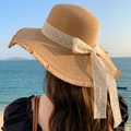 Women's khaki straw sun hat with white lace trim and bow, beach vacation style - Large Brim Ribbon Khaki