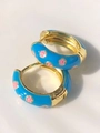Classic gold hoop earrings with sky blue enamel finish and pink floral patterns - Blue
