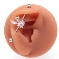 Close-up of pink crystal bunny industrial barbell piercing on a silicone ear model - Industrial Barbell / Silver/Pink Zirconia