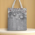 Detail of Christmas canvas tote bag featuring red berries and snowflakes on a white pedestal - Style 34