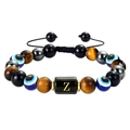 Detail of adjustable braided bracelet with 10mm tiger eye, evil eye bead, and letter Z charm - Letter Z