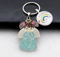 Detail of angel keychain with Schulkind rainbow glass charm and green enamel pendant - Sky Blue