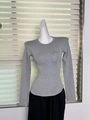 Detailed view of grey modal long sleeve shirt with shoulder pads and ribbed texture - XS / Grey Non-fleece