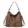 Close-up of leopard print tote bag with brown straps and golden hardware details - Single Piece / Leopard Brown