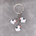 Cute white resin duck keychain with three ducklings and silver keyring for backpacks - 3-Piece Set / White