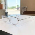 Occhiali da sole ovali in argento moderno con schermi laterali trasparenti per lo stile - Montatura Argento Lente Trasparente