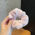 Pink plush scrunchie with soft ribbed texture shown held in hand for hair styling - 9002A Pink Purple Plush Scrunchie