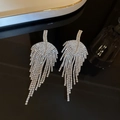 Detailed view of silver-tone tassel earrings with leaf-shaped rhinestone fringe - Feather Tassel (23#)
