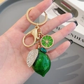 Porte-clés citron vert scintillant avec strass et fermoir doré pour sacs à main - Vert