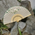 Classic Suzhou silk folding fan with white flower embroidery and green silk tassel - White Magnolia