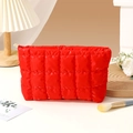 Portable red quilted cosmetic bag with gold zipper and spacious interior for travel - Clutch Bag / Red