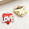 Red enamel heart charm with white LOVE lettering and golden metal backing pieces - Red White Love Heart (12296)