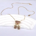 Collana dorata con ciondolo a cuore rosa e due charm a forma di bambina in zirconi su bianco - Stile due ragazze