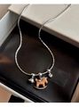 Detail of silver snake chain necklace featuring wooden horse, bell, and heart pendants - 3# Necklace Silver Coffee Triple Pendant