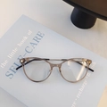 Retro round anti-blue light glasses with transparent tea frames and gold metal temples - Champagne