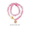 Detail of pink strawberry quartz beads with daisy pendant and carved center stone - Double Layer Pink Natural Stone Daisy Style (WB335)