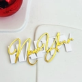 Detail of a layered Happy New Year acrylic cake topper with gold mirror finish - White & Gold Double Layer Happy New Year (Width approx. 8CM) / White/Gold