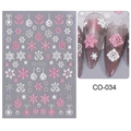 Detail view of pink and white Christmas nail stickers with snowflakes and bells patterns - CO-034