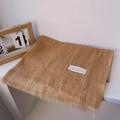 Detail of a mustard yellow cotton linen scarf featuring delicate fringe and brand label - 180*90CM / Ginger Patchwork