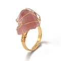Handmade wire-wrapped ring with irregular raw pink crystal and golden adjustable band - Strawberry Quartz