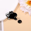 Detail showing a whimsical black cat enamel pin holding a fish glass on a floral backdrop - Black Cat with Wine Glass Style (CZ0546-3)