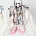 Fashionable floral silk scarf in pink and white tied on a blouse with professional styling - Light Pink Floral