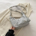 Grey marble pattern shoulder bag featuring silver butterfly accents and adjustable strap - Silver